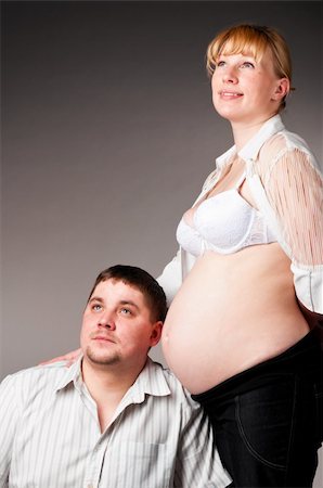 simsearch:400-04866555,k - man is trying to listen his baby inside of his pregnant wife Foto de stock - Super Valor sin royalties y Suscripción, Código: 400-04376696