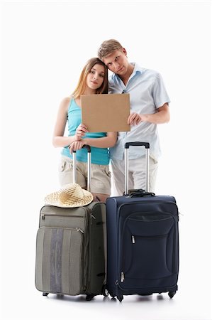 empty suitcase - Tired couple with suitcases and an empty plate isolated Stock Photo - Budget Royalty-Free & Subscription, Code: 400-04377643