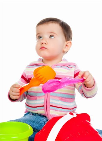 simsearch:400-04638236,k - little kid playing with colorful toys on a white background Photographie de stock - Aubaine LD & Abonnement, Code: 400-04378916