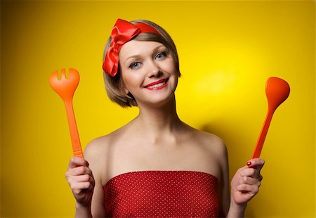 funny old people faces - Beautiful pinup style housewife with kitchen utensils Stock Photo - Budget Royalty-Free & Subscription, Code: 400-04370592