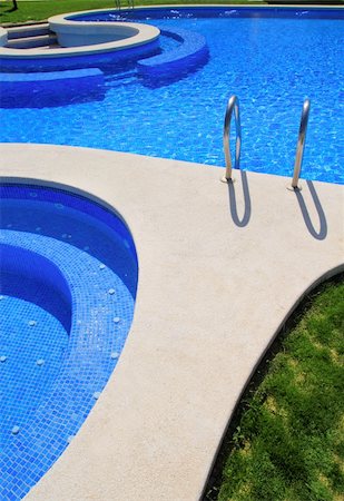 blue tiles swimming pool with green grass garden around Stock Photo - Budget Royalty-Free & Subscription, Code: 400-04371010