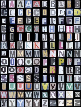 simsearch:400-05903482,k - Newspaper alphabet upper case over a black background Stock Photo - Budget Royalty-Free & Subscription, Code: 400-04371027