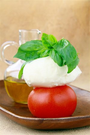 simsearch:700-01099893,k - Traditional Italian Caprese salad tomato mozzarella cheese and basil Stock Photo - Budget Royalty-Free & Subscription, Code: 400-04373014