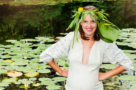 Portrait of young pregnant woman in traditional costume Stock Photo - Budget Royalty-Free & Subscription, Code: 400-04384594