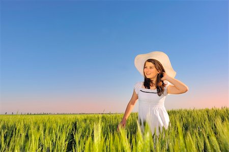 simsearch:400-04399510,k - Cute girl on green field Stock Photo - Budget Royalty-Free & Subscription, Code: 400-04385259