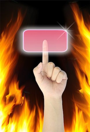 dangerous accident - hand pressing button on fire background Stock Photo - Budget Royalty-Free & Subscription, Code: 400-04385799