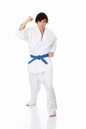 simsearch:400-05908874,k - Karate. Man in a kimono , isolated on the white background Stock Photo - Budget Royalty-Free & Subscription, Code: 400-04389837