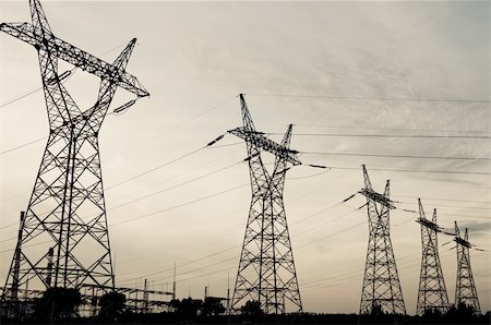 Pylon and transmission power line in sunset Photographie de stock - Aubaine LD & Abonnement, Code: 400-04380135