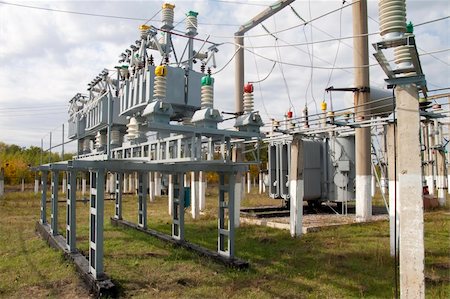 Power transformer in a distribution substation separated from another one by a wall. Stock Photo - Budget Royalty-Free & Subscription, Code: 400-04380533
