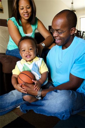 African american family playing in their home Foto de stock - Super Valor sin royalties y Suscripción, Código: 400-04382711