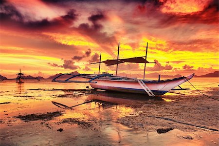 simsearch:400-04418173,k - Traditional philippine boat bangka at sunset time Stock Photo - Budget Royalty-Free & Subscription, Code: 400-04382971