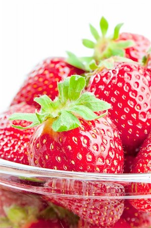 simsearch:400-05370991,k - Fresh ripe strawberries  in a glass bowl close-up isolated on white background Stock Photo - Budget Royalty-Free & Subscription, Code: 400-04383247