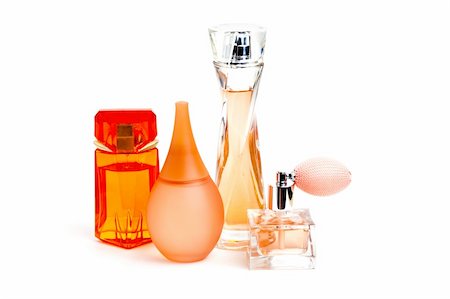 Orange perfume bottles isolated on white Stock Photo - Budget Royalty-Free & Subscription, Code: 400-04383443