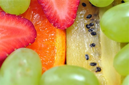 Delicious healthy colorful fruit salad: perfect food or diet background. Stock Photo - Budget Royalty-Free & Subscription, Code: 400-04383549