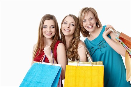 simsearch:400-04904785,k - Smiling girl with shopping bags on white background Stock Photo - Budget Royalty-Free & Subscription, Code: 400-04383801