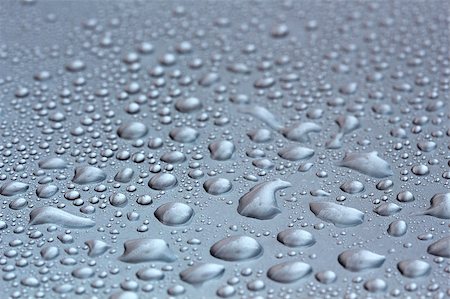 simsearch:614-06813723,k - Water droplets on a shining mettallic surface Stock Photo - Budget Royalty-Free & Subscription, Code: 400-04398249