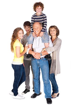 simsearch:400-07426233,k - Family portarit indoors while the young kid rests on his father's shoulders. Stock Photo - Budget Royalty-Free & Subscription, Code: 400-04398999