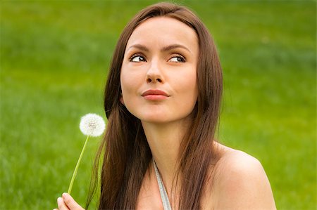simsearch:400-04399510,k - Girl with dandelion on green field Stock Photo - Budget Royalty-Free & Subscription, Code: 400-04399505