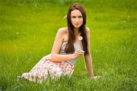 simsearch:400-04399510,k - Girl with dandelion on green field Stock Photo - Budget Royalty-Free & Subscription, Code: 400-04399506