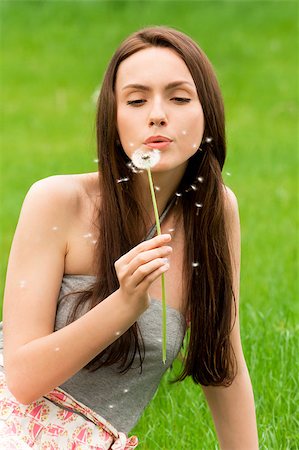 simsearch:400-04399510,k - Girl with dandelion on the green field Stock Photo - Budget Royalty-Free & Subscription, Code: 400-04399507