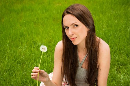 simsearch:400-04399510,k - Girl with dandelion on green field Stock Photo - Budget Royalty-Free & Subscription, Code: 400-04399500