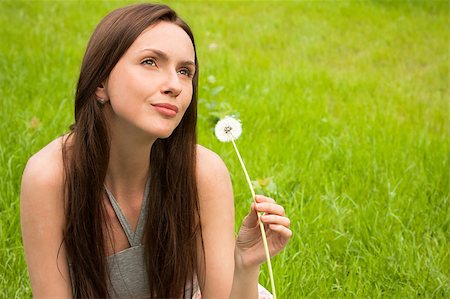 simsearch:400-04399510,k - Girl with dandelion on green field Stock Photo - Budget Royalty-Free & Subscription, Code: 400-04399501
