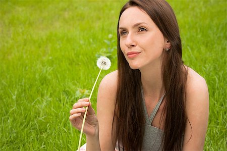simsearch:400-04399510,k - Girl with dandelion on green field Stock Photo - Budget Royalty-Free & Subscription, Code: 400-04399502