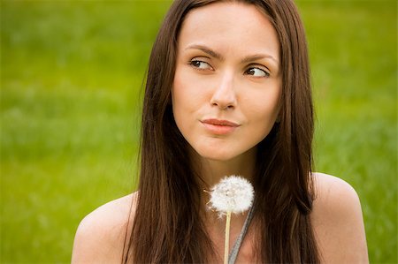 simsearch:400-04399510,k - Girl with dandelion on green field Stock Photo - Budget Royalty-Free & Subscription, Code: 400-04399511