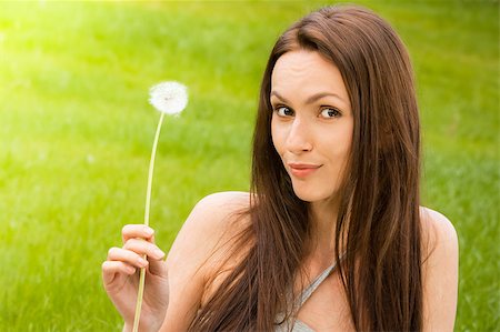 simsearch:400-04399510,k - Girl with dandelion on green field Stock Photo - Budget Royalty-Free & Subscription, Code: 400-04399513
