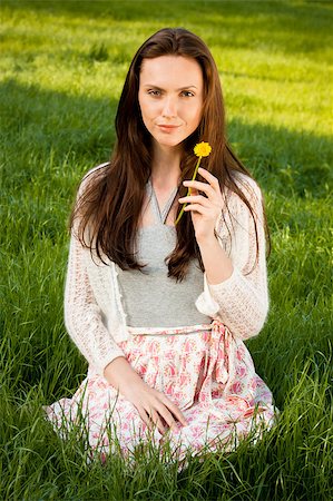simsearch:400-04399510,k - Girl with dandelion on green field Stock Photo - Budget Royalty-Free & Subscription, Code: 400-04399523