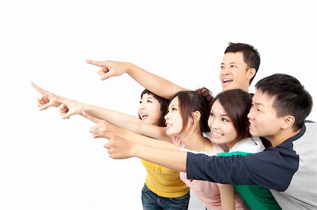 happy Asian young group pointing away isolated on white background Stock Photo - Budget Royalty-Free & Subscription, Code: 400-04390115