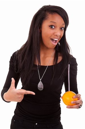 young black woman drinking orange juice Stock Photo - Budget Royalty-Free & Subscription, Code: 400-04390576
