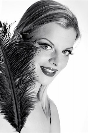 simsearch:400-04653285,k - b/w Portrait of sexy fashion woman with red lips in black dress with bird feather. white background Photographie de stock - Aubaine LD & Abonnement, Code: 400-04390879