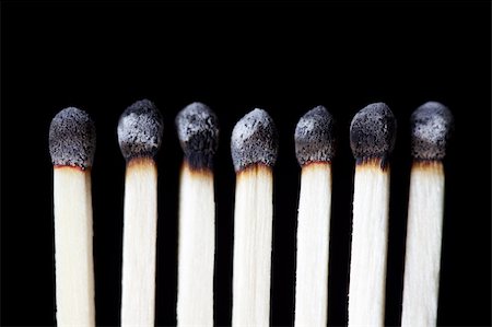 Row of seven burned down wooden matches Stock Photo - Budget Royalty-Free & Subscription, Code: 400-04391560