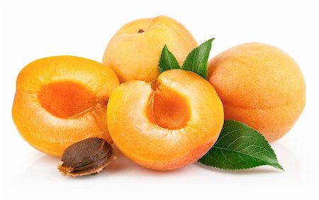 simsearch:400-05664137,k - apricot fruits with green leaf and cut isolated on white background Stock Photo - Budget Royalty-Free & Subscription, Code: 400-04393159