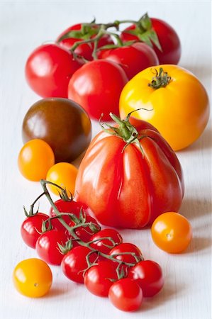 simsearch:400-04393672,k - Varied types of tomatoes on a white wooden table. Stock Photo - Budget Royalty-Free & Subscription, Code: 400-04393925