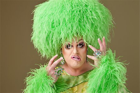 simsearch:400-04831298,k - Big drag queen in green outfit twists her lips Stock Photo - Budget Royalty-Free & Subscription, Code: 400-04405081