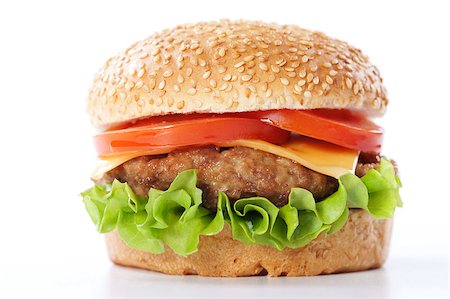simsearch:400-06090558,k - Cheeseburger with tomatoes and lettuce isolated on white Stock Photo - Budget Royalty-Free & Subscription, Code: 400-04406569