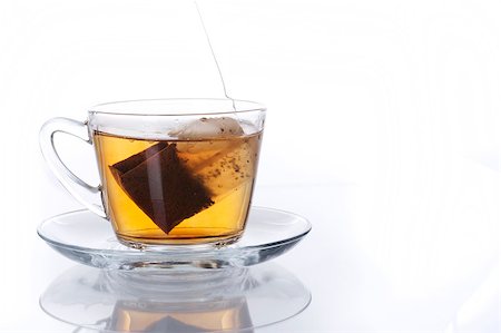 simsearch:400-04273561,k - Teabag in the cup with hot water Stock Photo - Budget Royalty-Free & Subscription, Code: 400-04406637