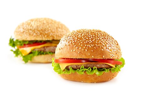 simsearch:400-06090558,k - two fresh cheeseburgers isolated on white background Stock Photo - Budget Royalty-Free & Subscription, Code: 400-04409602