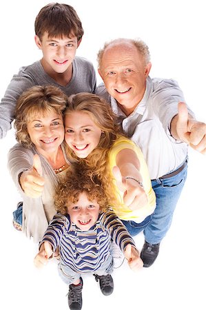 simsearch:400-07426233,k - Thumbs-up family posing in style, indoors against white background. Stock Photo - Budget Royalty-Free & Subscription, Code: 400-04400990