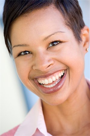 Head shot of woman smiling Stock Photo - Budget Royalty-Free & Subscription, Code: 400-04401894