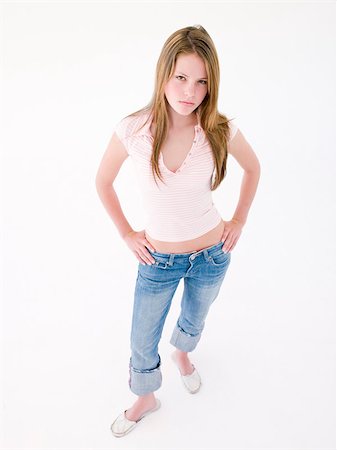 simsearch:400-04402256,k - Teenage girl with hands on hips frowning Stock Photo - Budget Royalty-Free & Subscription, Code: 400-04402227