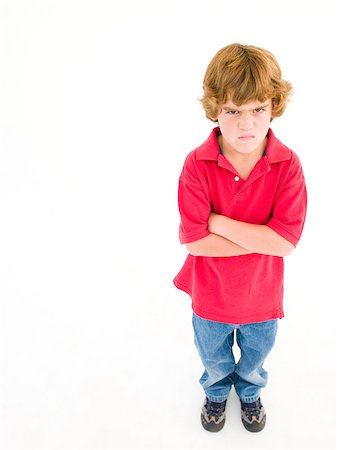 simsearch:400-04402256,k - Young boy with arms crossed angry Stock Photo - Budget Royalty-Free & Subscription, Code: 400-04402351