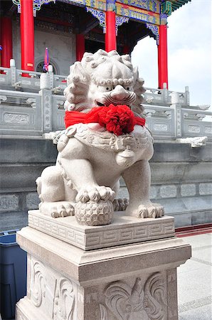 Chinese Lion Stone Sculpture in the Chinese Temple in Asia , Thailand Stock Photo - Budget Royalty-Free & Subscription, Code: 400-04403283