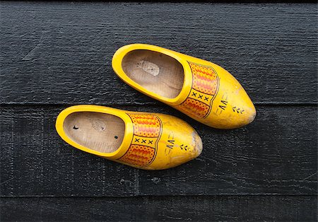 traditional dutch wooden shoes hanging at a wall Stock Photo - Budget Royalty-Free & Subscription, Code: 400-04416372