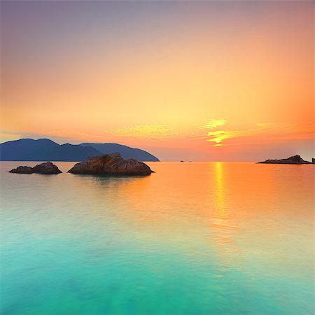 Sunrise over the sea. Con Dao. Vietnam Stock Photo - Budget Royalty-Free & Subscription, Code: 400-04418171