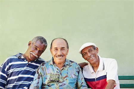 simsearch:400-06142278,k - portrait of senior hispanic man with white hat looking at camera against green wall and smiling. Horizontal shape, copy space Stock Photo - Budget Royalty-Free & Subscription, Code: 400-04410043