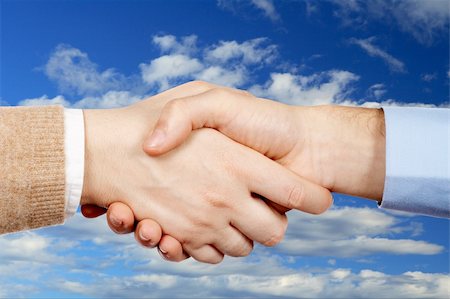 simsearch:400-04333648,k - Business handshake over a sky background Stock Photo - Budget Royalty-Free & Subscription, Code: 400-04425477