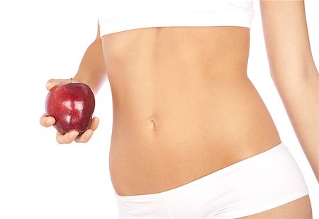 simsearch:400-04423098,k - Beautiful woman's body in white underwear holding an apple isolated over white background Stock Photo - Budget Royalty-Free & Subscription, Code: 400-04422681